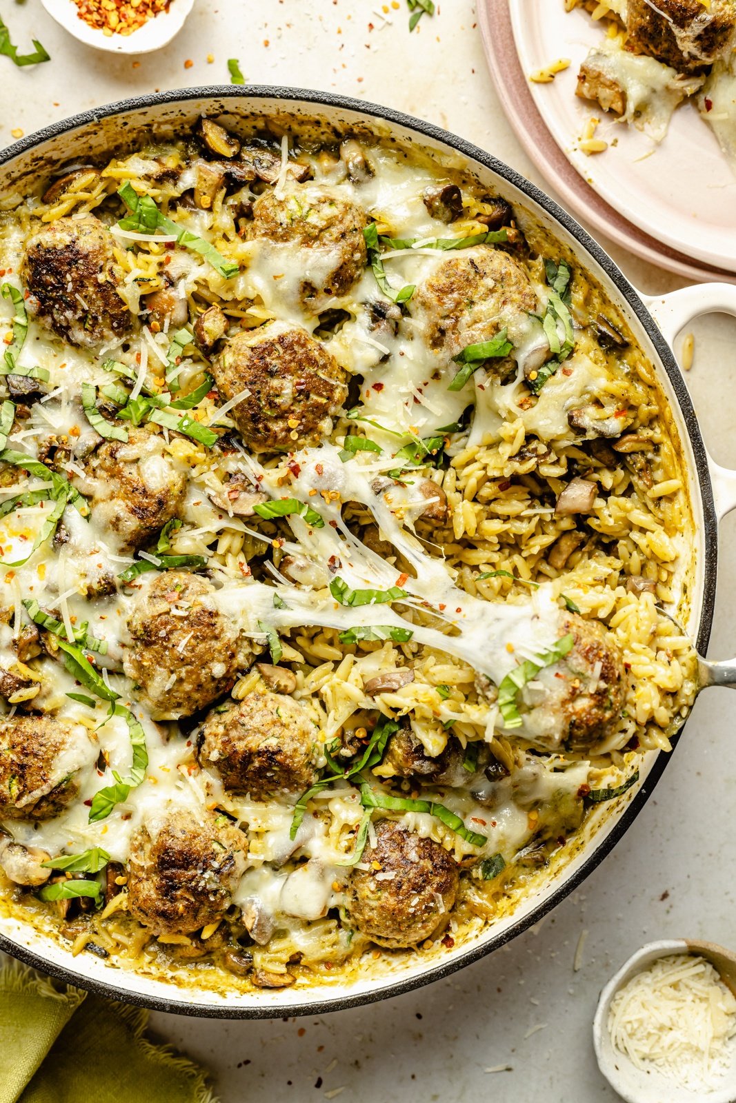 One Pan Baked Pesto Orzo with Chicken Meatballs